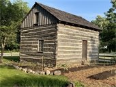 Photo of the Ott Log House, the oldest building in Lake County