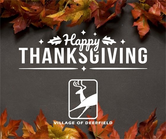 "Happy Thanksgiving" and Village logo in white over a dark background with orange leaves at the top and bottom