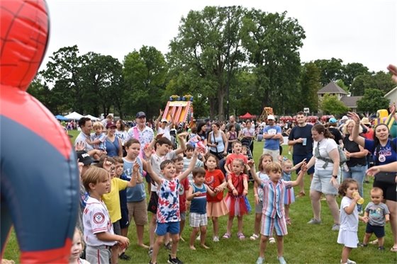 Photo of kids dancing in patriotic colors at Family Days