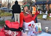 Photo of the DBR Chamber holiday elf, Elfa, at the Downtown Lighting Ceremony